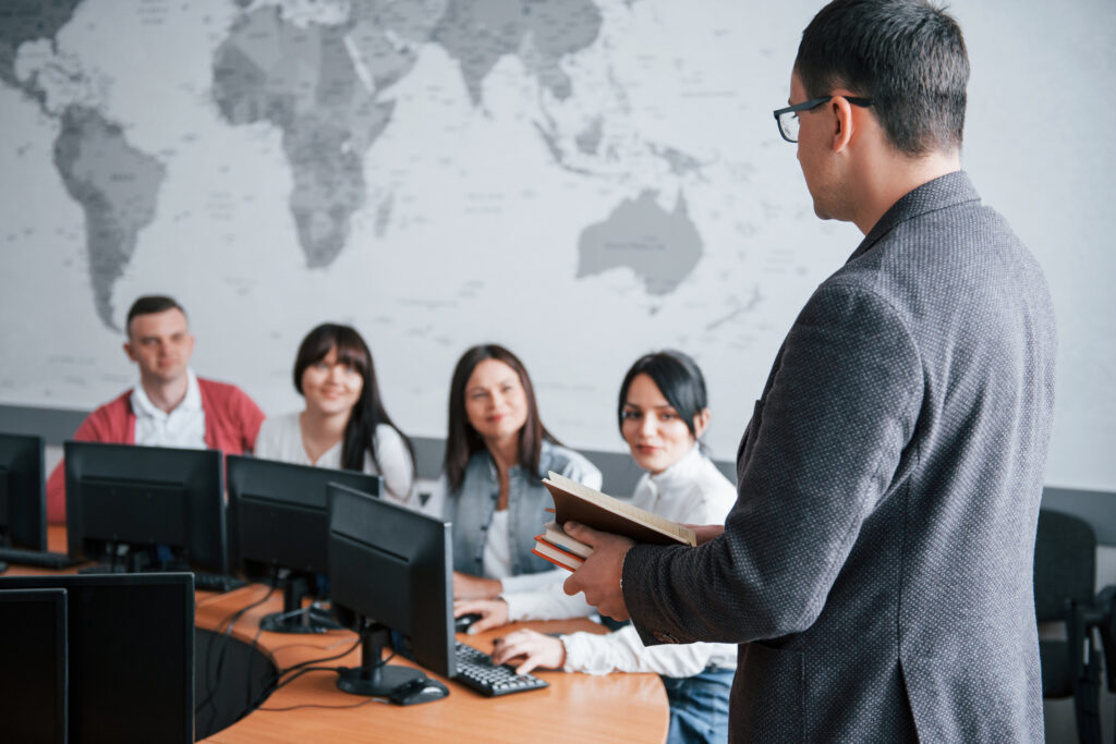 Group of professionals in a daytime business conference in a modern classroom